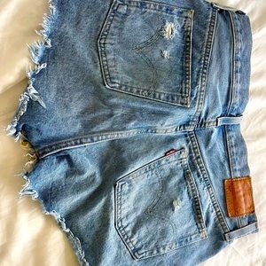 High waisted, distressed Levi's jean shorts
